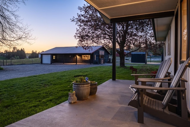 10409 E Palouse Hwy, Valleyford, WA 99036 - view of patio / terrace with driveway and a garage