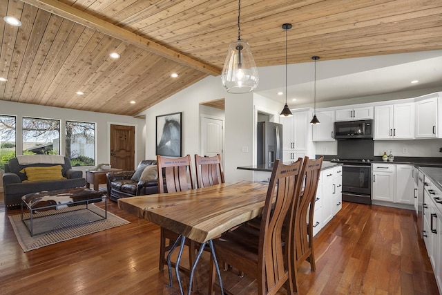 10409 E Palouse Hwy, Valleyford, WA 99036 - dining area with dark wood finished floors, recessed lighting, and wooden ceiling