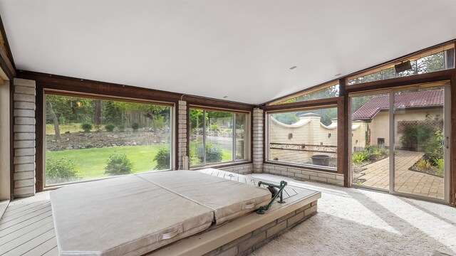 13110 W Charles Rd, Nine Mile Falls, WA 99026 - sunroom / solarium with vaulted ceiling and a hot tub