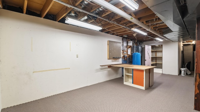13110 W Charles Rd, Nine Mile Falls, WA 99026 - unfinished below grade area featuring carpet floors and a water pressure tank