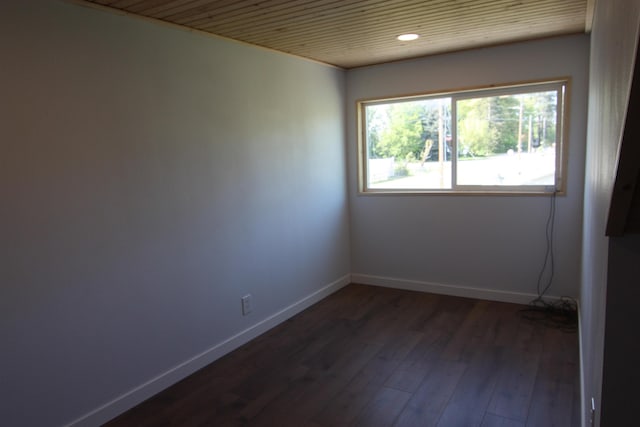 117 5th Ave, Cusick, WA 99119 - unfurnished room with baseboards, dark wood finished floors, wood ceiling, and recessed lighting