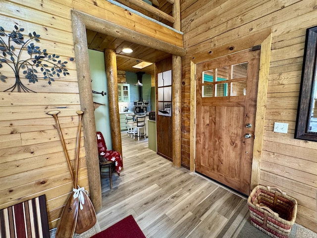 812 Levitch Rd, Newport, WA 99156 - entryway featuring wood walls and light wood-style floors