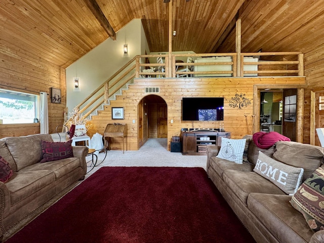 812 Levitch Rd, Newport, WA 99156 - living room featuring high vaulted ceiling, wood ceiling, carpet, stairs, and wooden walls