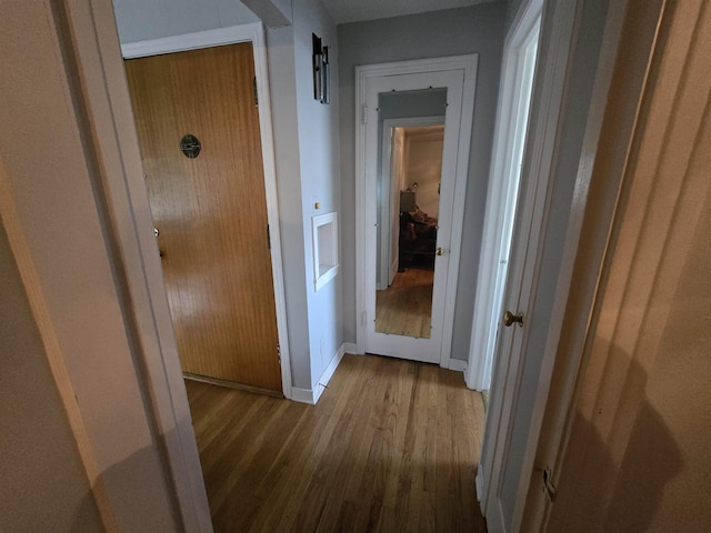 405 S Coeur Dalene St Unit 11, Spokane, WA 99201 - hall with wood finished floors and baseboards