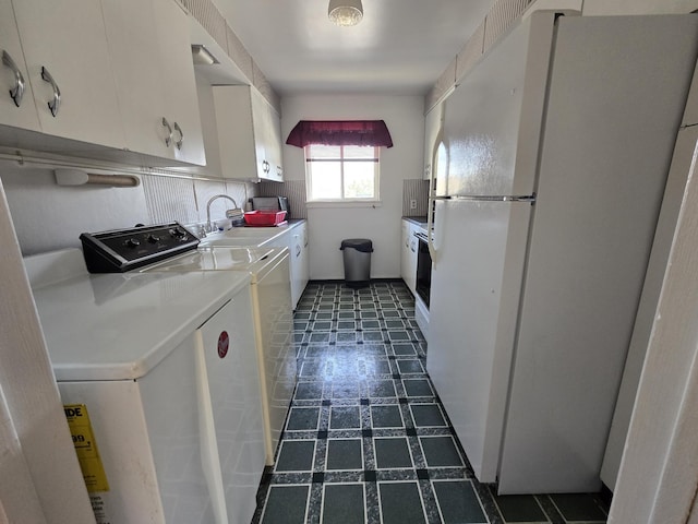 405 S Coeur Dalene St Unit 11, Spokane, WA 99201 - laundry area featuring washing machine and dryer