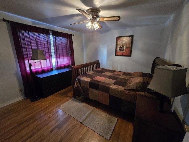 405 S Coeur Dalene St Unit 11, Spokane, WA 99201 - bedroom featuring wood finished floors, ceiling fan, and baseboards
