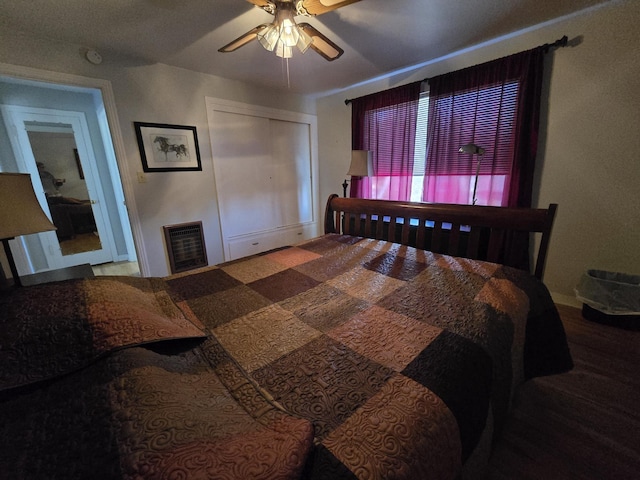 405 S Coeur Dalene St Unit 11, Spokane, WA 99201 - bedroom featuring heating unit, a ceiling fan, and a closet