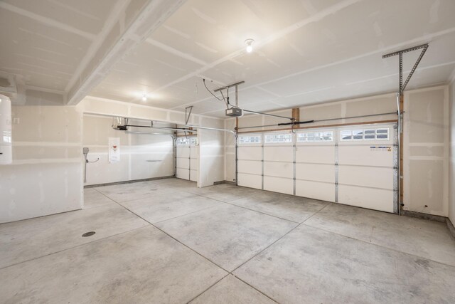 8566 N Oak St, Spokane, WA 99208 - garage featuring a garage door opener