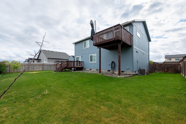 8566 N Oak St, Spokane, WA 99208 - back of property featuring a wooden deck, central AC unit, and crawl space