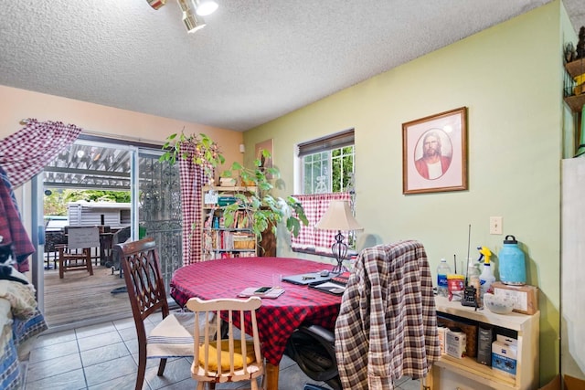 2029 E Sharp Ave, Spokane, WA 99202 - dining room featuring a textured ceiling