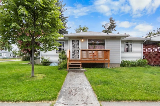 2029 E Sharp Ave, Spokane, WA 99202 - view of front facade featuring a wooden deck and a front lawn