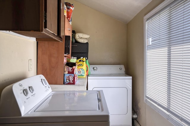 918 E Baldwin Ave, Spokane, WA 99207 - washroom with washer and clothes dryer, healthy amount of natural light, and cabinet space