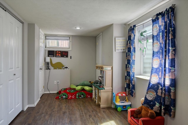 301 E Ermina Ave, Spokane, WA 99207 - recreation room featuring wood finished floors, plenty of natural light, baseboards, and recessed lighting