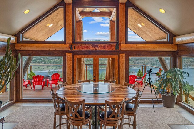 33905 Winterwood Ln Unit E, Davenport, WA 99122 - dining room featuring healthy amount of natural light, high vaulted ceiling, french doors, and recessed lighting