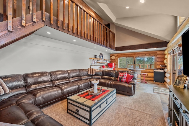 33905 Winterwood Ln Unit E, Davenport, WA 99122 - tiled living area featuring high vaulted ceiling, rustic walls, and recessed lighting
