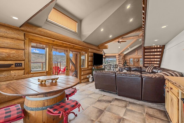 33905 Winterwood Ln Unit E, Davenport, WA 99122 - living room featuring rustic walls, high vaulted ceiling, recessed lighting, and a ceiling fan