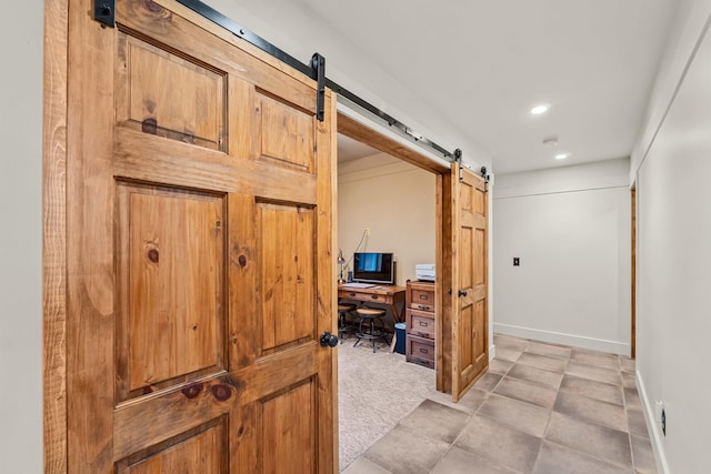 33905 Winterwood Ln Unit E, Davenport, WA 99122 - hall with a barn door, an office area, recessed lighting, and baseboards