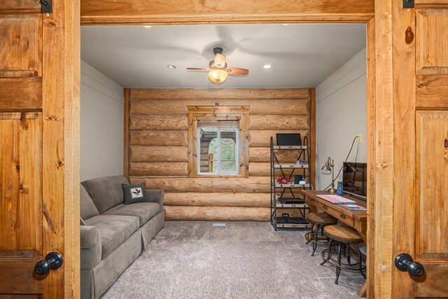 33905 Winterwood Ln Unit E, Davenport, WA 99122 - carpeted office space featuring log walls and a ceiling fan