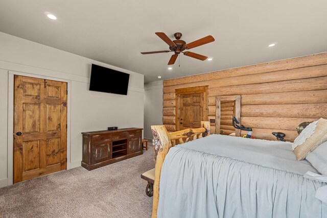 33905 Winterwood Ln Unit E, Davenport, WA 99122 - bedroom with recessed lighting, log walls, carpet flooring, and a ceiling fan