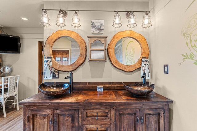 33905 Winterwood Ln Unit E, Davenport, WA 99122 - full bath featuring double vanity, wood finished floors, and recessed lighting