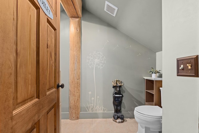 33905 Winterwood Ln Unit E, Davenport, WA 99122 - bathroom with toilet, tile patterned flooring, lofted ceiling, and vanity