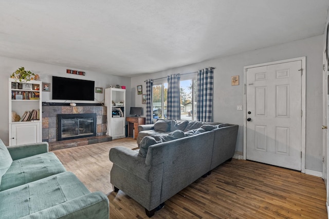 3006 W Francis Ave, Spokane, WA 99205 - living area featuring wood finished floors and a fireplace
