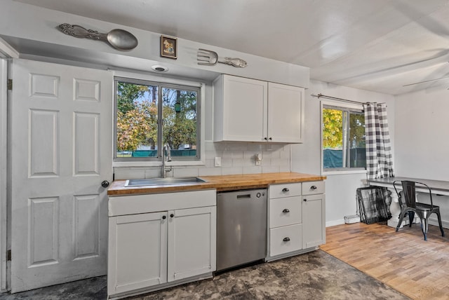 3006 W Francis Ave, Spokane, WA 99205 - kitchen with dishwasher, butcher block counters, a sink, and plenty of natural light