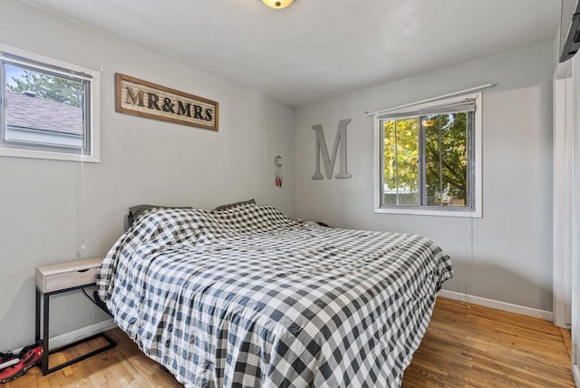 3006 W Francis Ave, Spokane, WA 99205 - bedroom featuring wood finished floors and baseboards