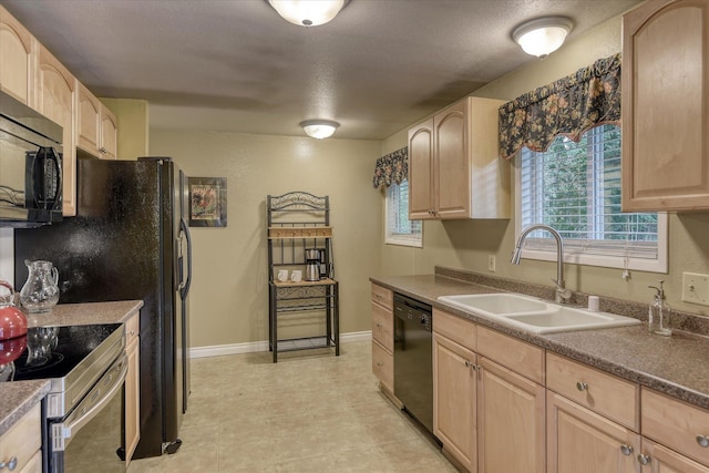 1829 S Glenrose Rd, Spokane, WA 99223 - kitchen featuring light brown cabinetry, a sink, black dishwasher, and stainless steel electric range