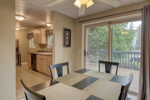 1829 S Glenrose Rd, Spokane, WA 99223 - dining area with a ceiling fan, a textured ceiling, and baseboards