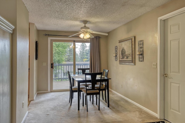 1829 S Glenrose Rd, Spokane, WA 99223 - dining room featuring a ceiling fan, light carpet, a textured ceiling, and baseboards