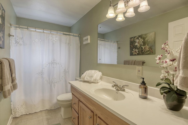 1829 S Glenrose Rd, Spokane, WA 99223 - full bath featuring vanity, toilet, a shower with curtain, and a chandelier