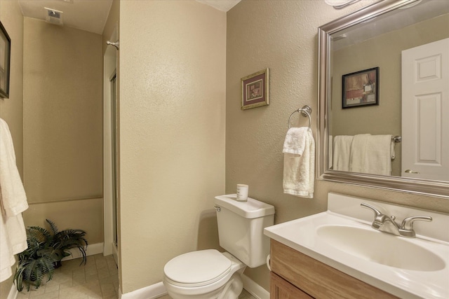 1829 S Glenrose Rd, Spokane, WA 99223 - bathroom with vanity, toilet, baseboards, and a shower