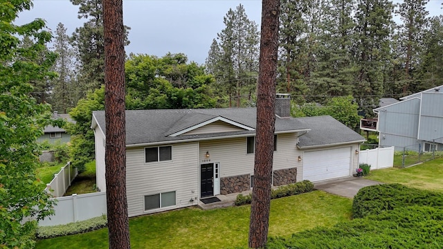 1829 S Glenrose Rd, Spokane, WA 99223 - view of front of house featuring a garage, a shingled roof, and concrete driveway