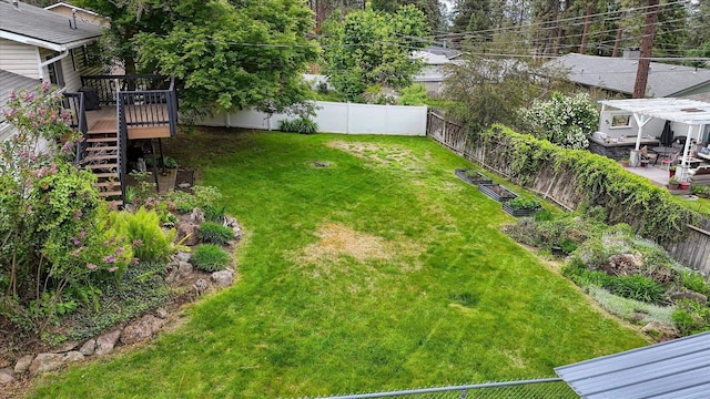 1829 S Glenrose Rd, Spokane, WA 99223 - view of yard featuring stairs and a wooden deck