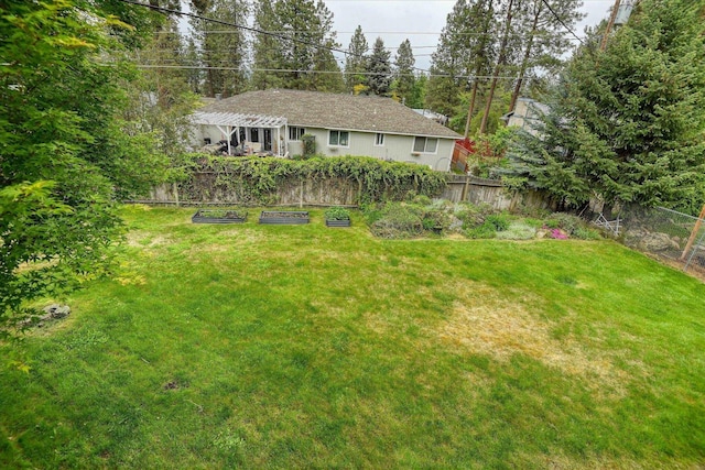 1829 S Glenrose Rd, Spokane, WA 99223 - view of yard featuring a vegetable garden