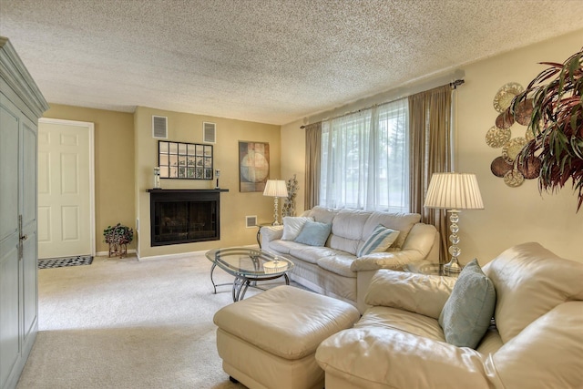 1829 S Glenrose Rd, Spokane, WA 99223 - living room with carpet floors, a textured ceiling, a fireplace, and baseboards