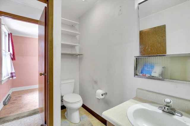 603 E Providence Ave, Spokane, WA 99207 - bathroom with baseboard heating, toilet, healthy amount of natural light, and baseboards