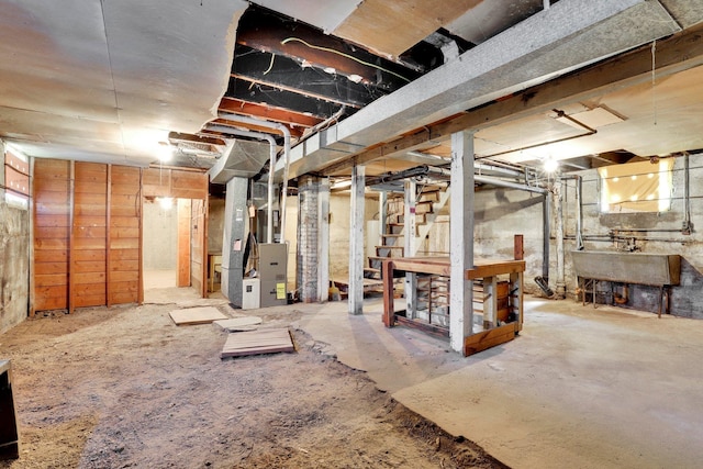603 E Providence Ave, Spokane, WA 99207 - unfinished basement with a sink and heating unit