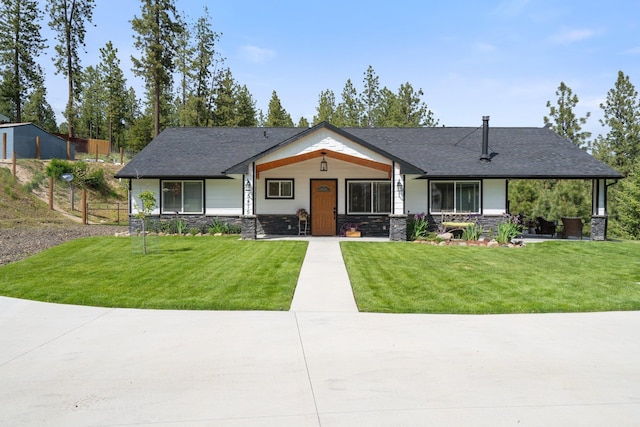 5475 Peggy Way, Deer Park, WA 99006 - view of front facade with a front yard, stone siding, and covered porch