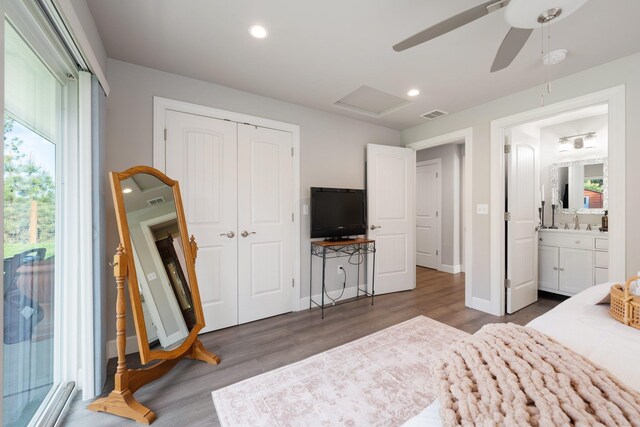 5475 Peggy Way, Deer Park, WA 99006 - bedroom featuring wood finished floors, a closet, recessed lighting, baseboards, and a ceiling fan