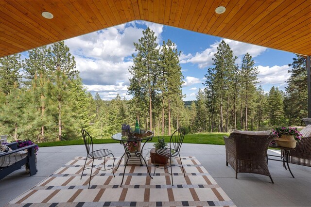 5475 Peggy Way, Deer Park, WA 99006 - view of patio / terrace with a forest view
