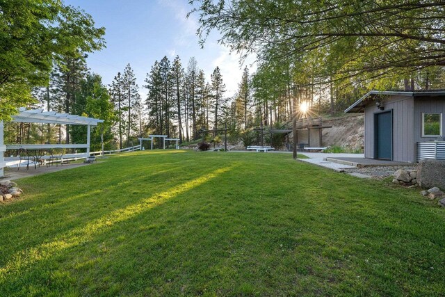 5475 Peggy Way, Deer Park, WA 99006 - view of green lawn featuring an outbuilding