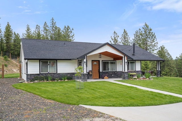 5475 Peggy Way, Deer Park, WA 99006 - view of front of property featuring stone siding, a front lawn, roof with shingles, and covered porch