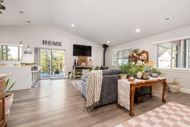 5475 Peggy Way, Deer Park, WA 99006 - living area featuring light wood-style flooring, recessed lighting, and high vaulted ceiling