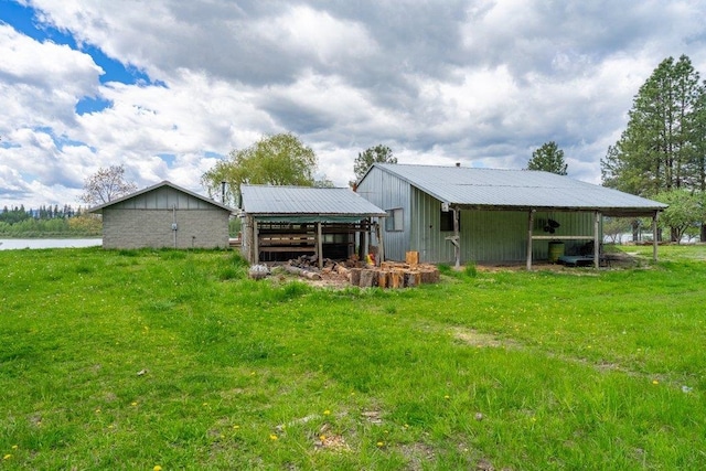 472 Snow Berry Ln, Usk, WA 99180 - rear view of house featuring an outbuilding