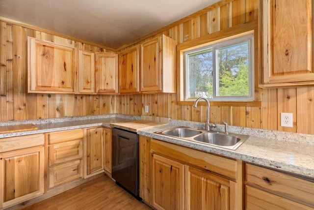 472 Snow Berry Ln, Usk, WA 99180 - kitchen featuring a sink, dishwasher, light countertops, light wood-type flooring, and wood walls