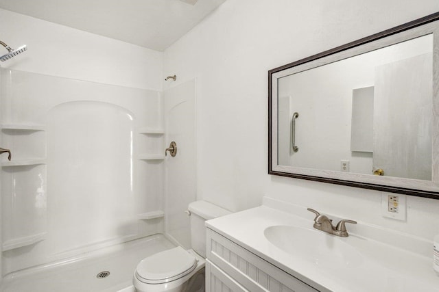 472 Snow Berry Ln, Usk, WA 99180 - bathroom featuring a shower, toilet, and vanity
