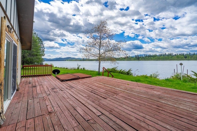 472 Snow Berry Ln, Usk, WA 99180 - deck featuring a water view