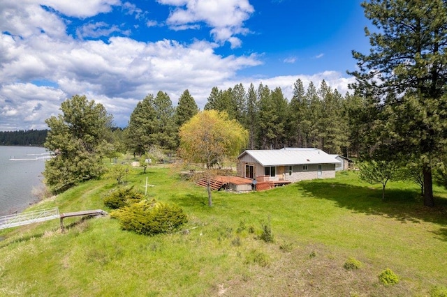 472 Snow Berry Ln, Usk, WA 99180 - view of subject property with a forest and a large body of water